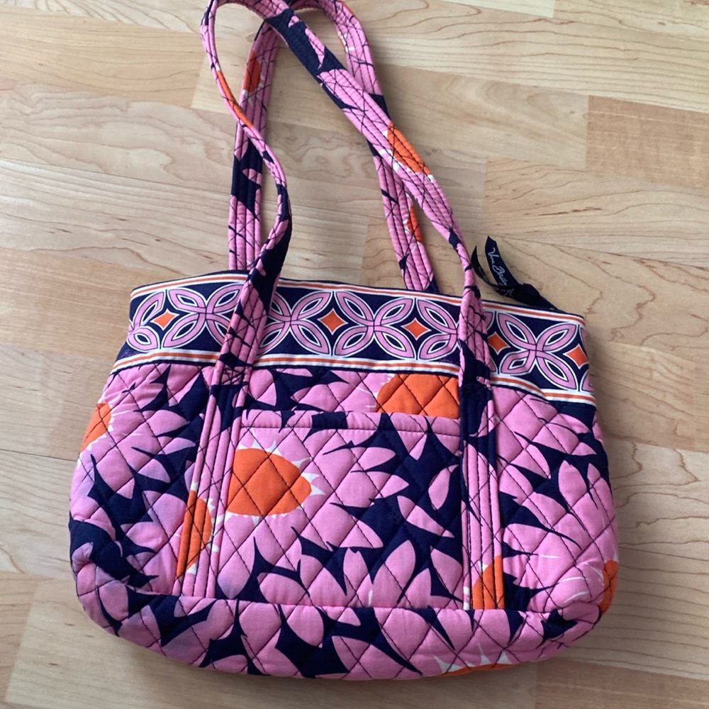 Vera Bradley pink, navy and orange floral purse with separated pockets inside